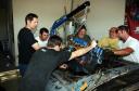 This is MyRideisMe.com - 6 guys tearing out an engine