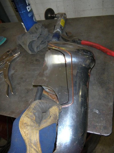 Custom bumber how-to showing tig rod to shape and marked