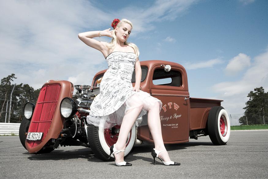 Pinup model Zoe Scarlett with 1932 Ford pickup primer red