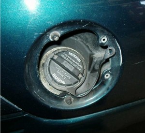 Stock gas cap removed and ready for the Bullitt cap