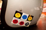 Larry Volk's retired racing helmet and old Bonneville Salt Flats tech inspection stickers