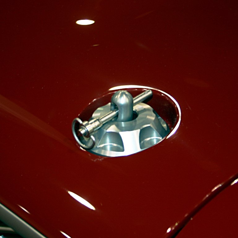 Custom machined hood latch pins on the Ring Brothers' "Afterburner" 1964 Ford Fairlane