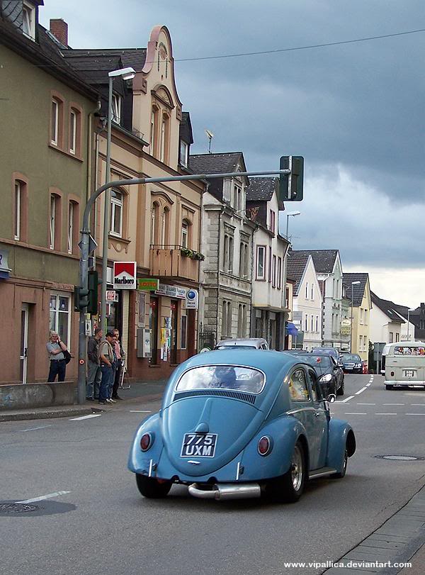 Cal Look Bug cruising down a quaint street in Germany