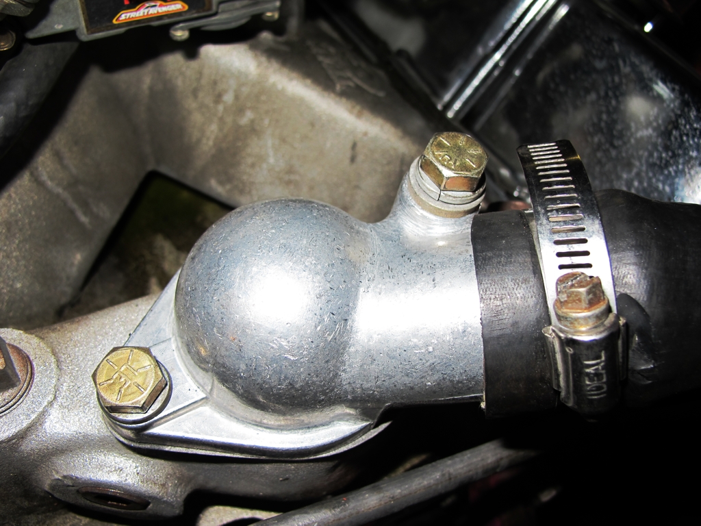 replace thermostat housing, small block chevy, car overheating problems, how-to fix engine overheating, chevy overheating