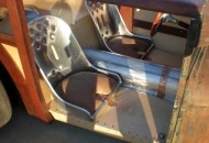 bomber seats with worn leather note copper on tunnel and seats