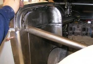 There will be nothing onthe firewall except for a reflection from the engine. Notches to clear the 5" Muffler.