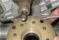 The HTOB slips over the front bearing retainer and uses O-rings to keep it held in place.