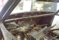 Completely gutted interior with instruments mounted onto the steering column.