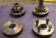 The original "blanks" in which I used the OEM companion flanges to set the bolt pattern for attaching the plates to the Datsun axle.