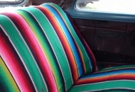I have some Mexican blanket pieces cut to do the backseat  side panels, just haven't had the time to get the thin paneling to cut the panels.