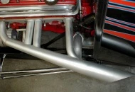 I blocked off the lake pipes at the last couple of inches and sneaked the exhaust inside the frame rails