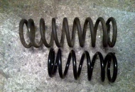 Original frotn spring on top and new custom fabbed lowered version on the bottom - that's about 3.5/4" of difference