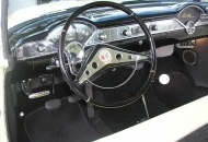 I added a 58 Impala steering wheel because I think they look a little sportier than the stock 56 wheel.