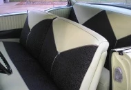 Stock 56 front bench seat covered to match original 56 interior.