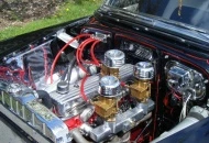 216ci 6 cylinder with rare Rajo racing head, 2 part intake with 3 carbs