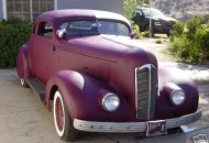 Done as the days of old, this car is done in Harry Westergard style.The car is chopped 3.5 inchs,lowered Packard Grill,Desoto Bumpers,Buick Skirts,shaved doors,Molded and widened rear fenders,Molded front fenders and head lights.