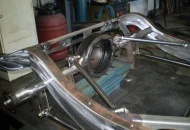 Traditional 4 bar rear setup, all stainless and polished.
