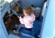 My niece driving the cool car