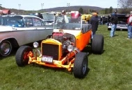 My 35 Chevy in background with hood open.