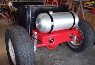 I built the rear deck. Painted it with the same TSC Ford Tractor Red Spray cans..........came out pretty good.