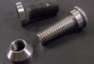 I made these little tapered nuts to mount 3/8" button head bolts instead of the bolts that came with the spindles.